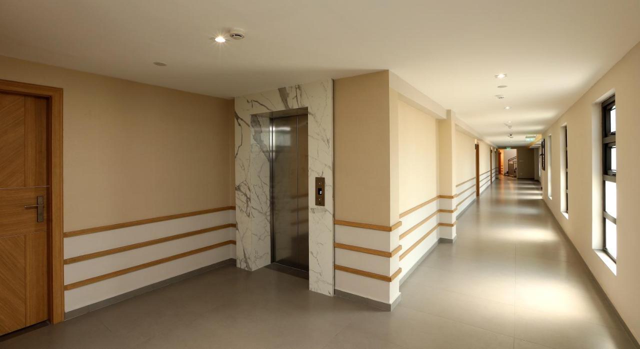 Hotel Flora Charishma Residency Aluva à Kochi Extérieur photo